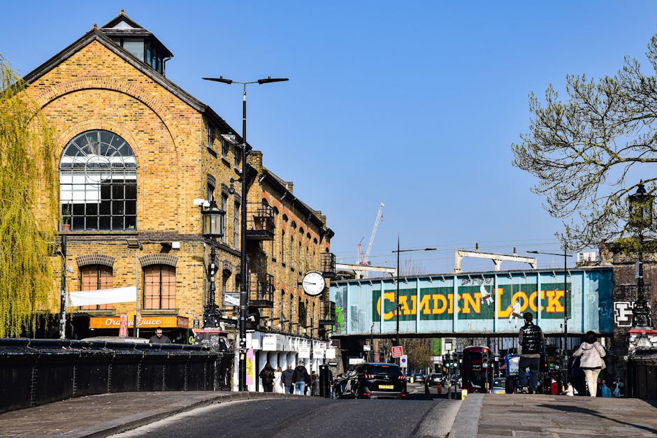 A close-up of a brick building corner with two white street name plaques, one reading 'Carey Street' and the other 'Star Yard,' both bearing the green Camden Council logo and WC2 postal codes. The bri